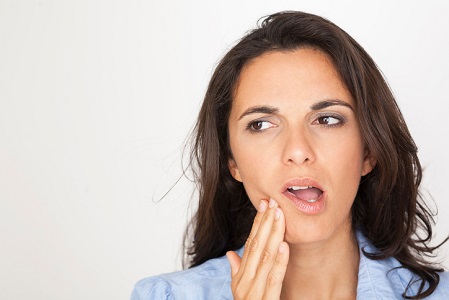 woman in tooth pain