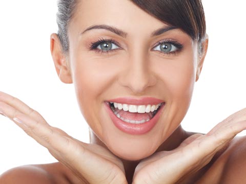 Invisalign Dentist Wichita KS - Woman Smiling after dentist treats